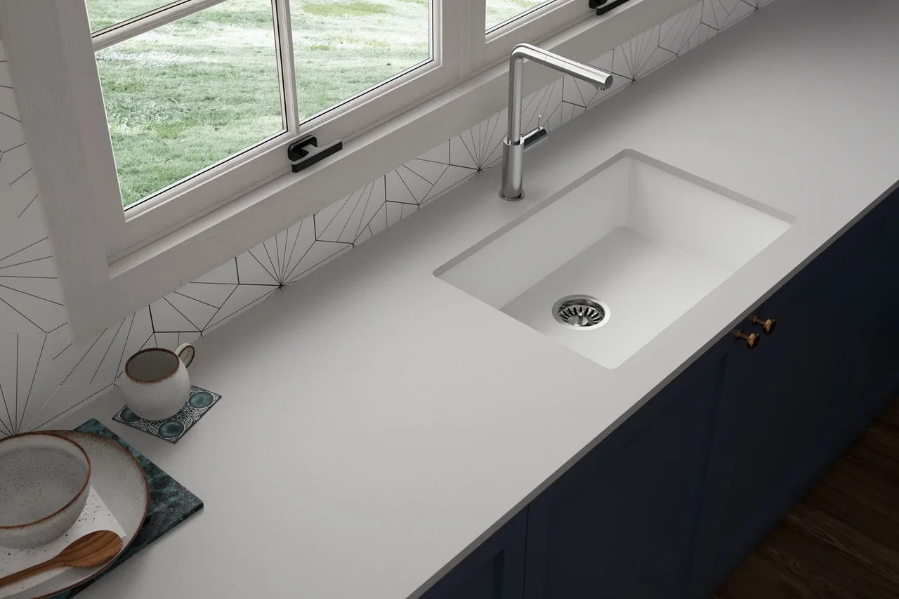 White solid surface countertop with integrated sink